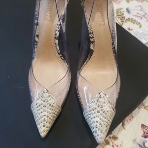 Schutz snake print pumps.